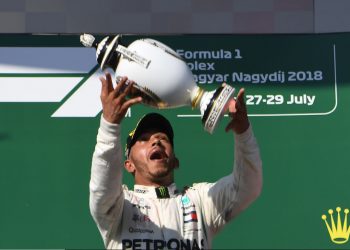 Lewis Hamilton celebrates with the Hungarian GP tittle, Sunday