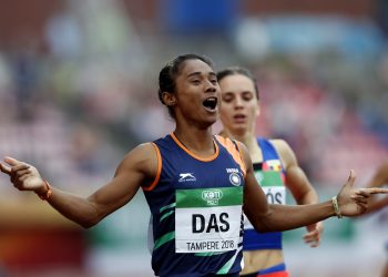 Hima Das (in front) celebrates her victory in women's 400m at the 2018 IAAF World U-20 Championships in Tampere, Finland