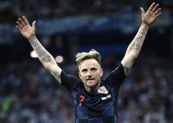 Ivan Rakitic celebrates after scoring the winning penalty against Russia