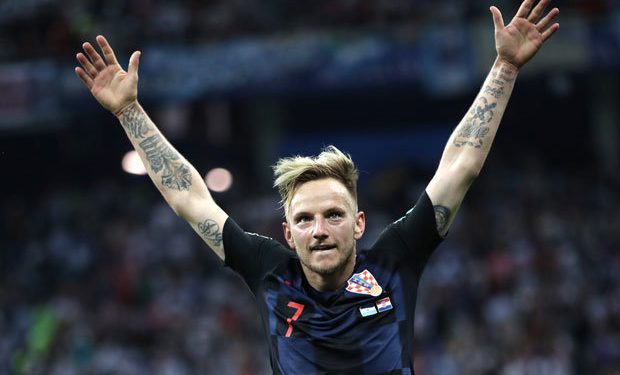 Ivan Rakitic celebrates after scoring the winning penalty against Russia