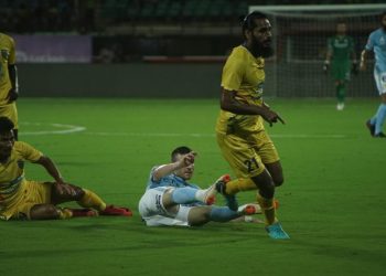Kerala Blasters FC (in yellow) and Melbourne City FC players in action during their match