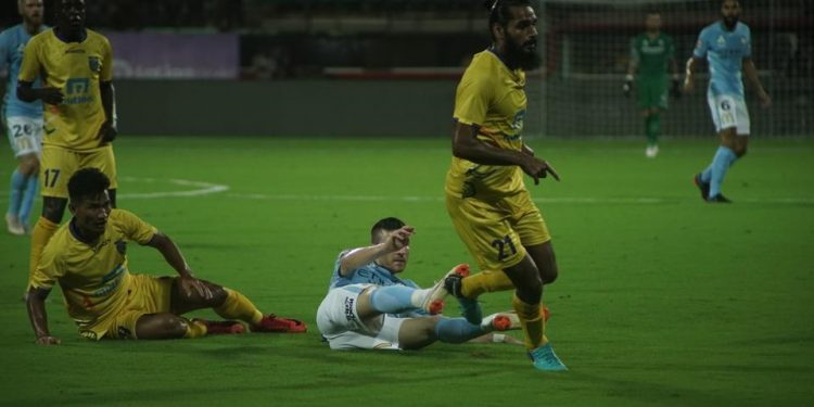 Kerala Blasters FC (in yellow) and Melbourne City FC players in action during their match