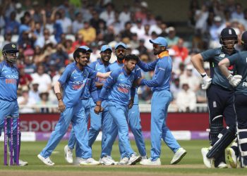 Teammates congratulate Kuldeep Yadav after he dismissed England's Jonny Bairstow, Thursday