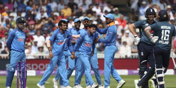 Teammates congratulate Kuldeep Yadav after he dismissed England's Jonny Bairstow, Thursday