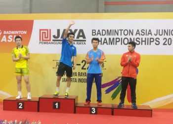 Lakshya Sen (hands raised) receives applause from spectators on the podium after winning men’s single’s gold at Asia Junior Badminton Championships in Jakarta, Sunday