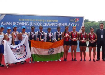 Indian team comprising of four Odisha players (C) pose with the Tricolour and their gold medals at Chungju, Friday