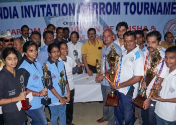 Winners of IIIrd Invitational All India Carrom Tournament pose with their winners’ trophies at Cuttack, Sunday     