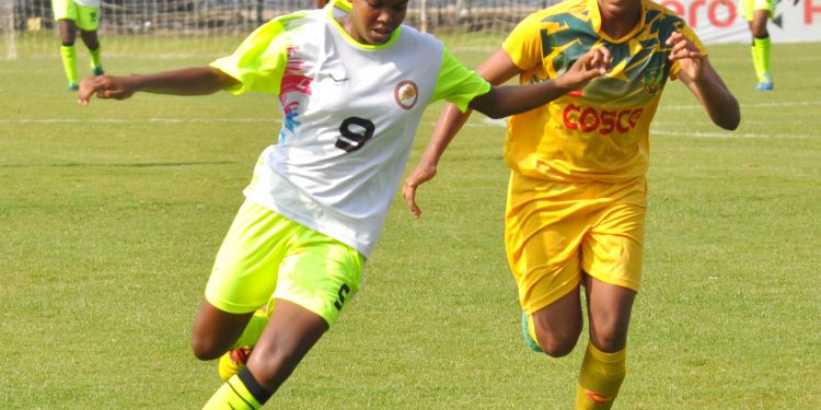 Manisha Naik (L) in action against Kerala at the Barabati Stadium, Tuesday