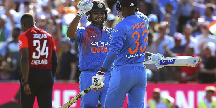 Rohit Sharma and Hardik Pandya celebrate India's victory against England in the final T20 game, Sunday
