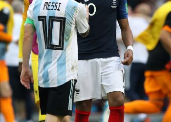 Argentina’s Lionel Messi congratulates France’s Kylian Mbappe (R) after their match at Kazan, Saturday