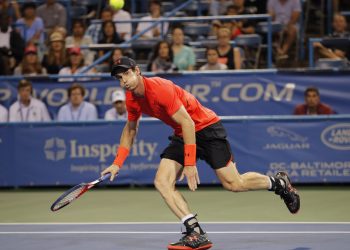 Andy Murray of Britain chases a ball to return against Mackenzie McDonald, Tuesday