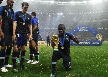 N'Golo Kante poses with the World Cup at the Luzhniki Stadium