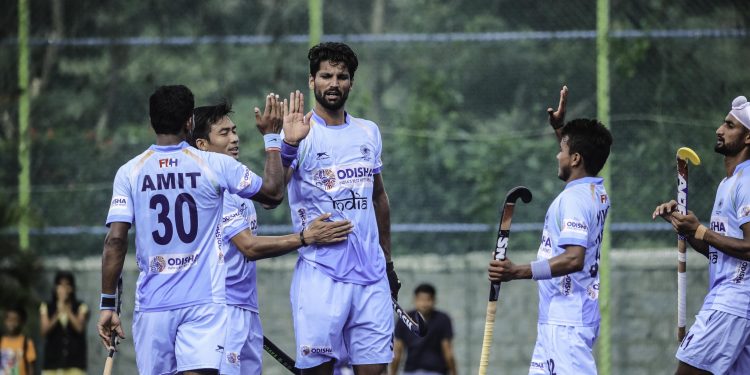 Rupinder Pal Singh celebrates after scoring the opening goal for India against New Zealand, Saturday