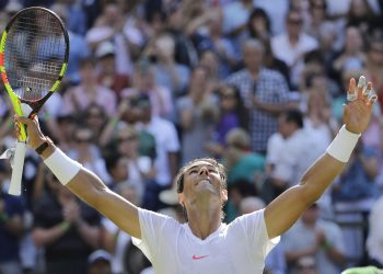 Rafa Nadal who has lost five first round matches in his last six visits to Wimbledon, celebrates his win Tuesday over Dudi Sela