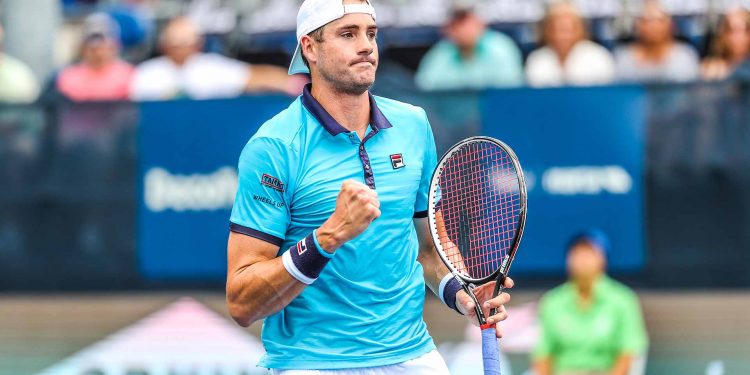 John Isner celebrates after beating Mischa Zverev at Los Angeles, Saturday