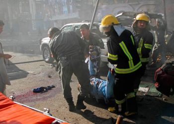 File photo: Emergency personnel remove a body at the site of a deadly suicide attack in Afghanistan’s Jalalabad June 7, 2018.