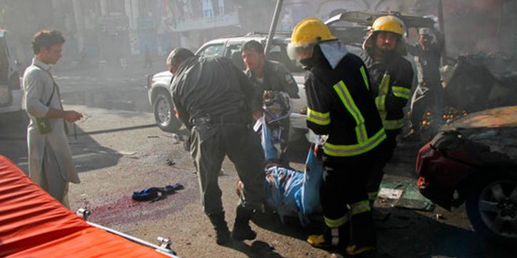 File photo: Emergency personnel remove a body at the site of a deadly suicide attack in Afghanistan’s Jalalabad June 7, 2018.