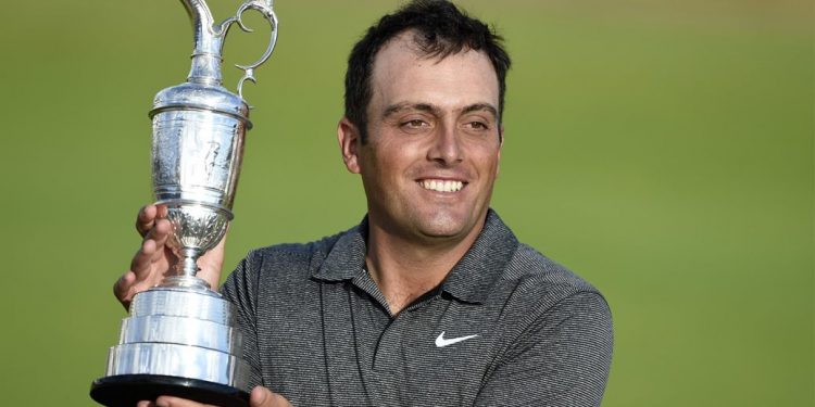 Francesco Molinari poses with the Claret Jug after his title triumph, Sunday