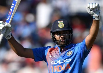 Rohit Sharma celebrates after his century against England, Sunday