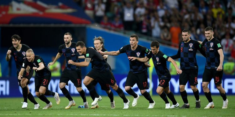 Croatia players celebrate after their win over Russia in the World Cup quarterfinal at Sochi, Saturday