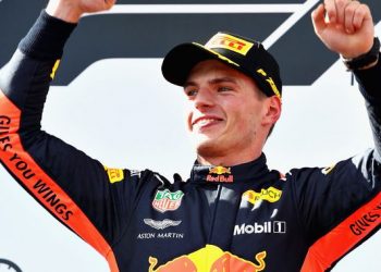 Max Verstappen celebrates after winning the Austrian Grand Prix title at Spielberg, Sunday