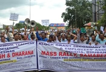 Block grant secondary school teachers and employees take out a rally at PMG Square in Bhubaneswar, Thursday, to press for their various demands including grant-in-aid as per the GIA order-1994.