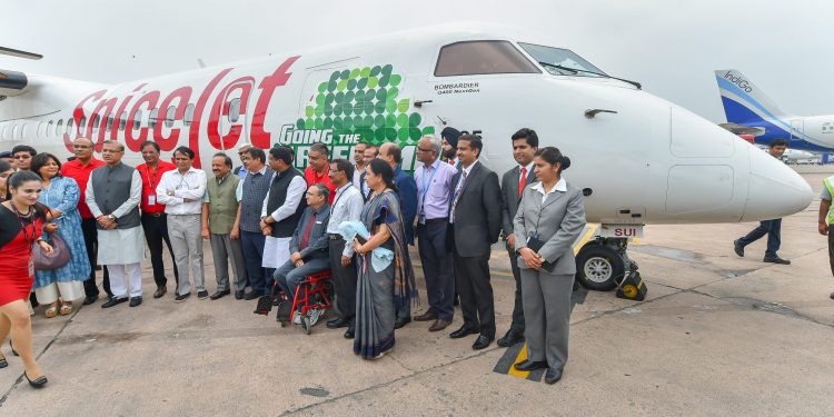 Union Ministers Suresh Prabhu, Nitin Gadkari, Harsh Vardhan, Jayant Sinha, Dharmendra Pradhan and others after the landing of the first flight, running on biofuel, at Delhi Airport terminal on Monday	PTI Photo