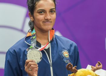 Women's singles badminton silver medalist PV Sindhu poses for a photograph during the medal ceremony of the event at the Asian Games in Jakarta