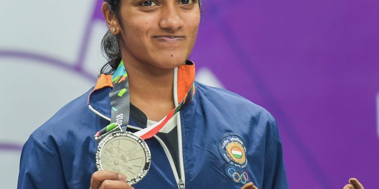 Women's singles badminton silver medalist PV Sindhu poses for a photograph during the medal ceremony of the event at the Asian Games in Jakarta