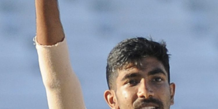 Jasprit Bumrah shows off the match ball after completing his five-wicket haul, Tuesday