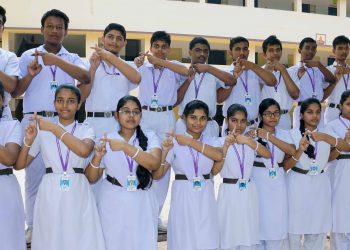 Students of Tulasipur Saraswati Sishu Vidyamandir in Cuttack support plastic-free drive, Friday.