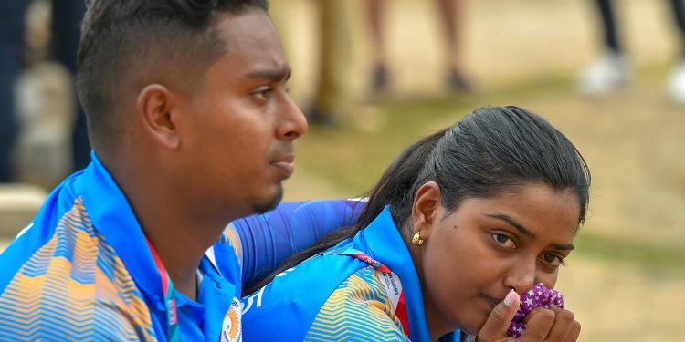 Indian archers Deepika Kumari and Atanu Das look dejected after recurve in mix team elimination event at the Asian Games