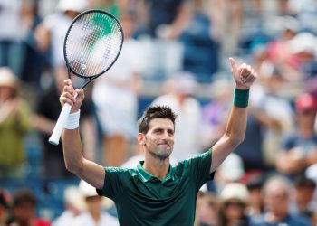 Novak Djokovic acknowledges the applause of the crowd after his win Tuesday over Mirza Basic at Montreal