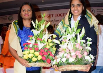 Dutee Chand (L) and Rutuparna Panda pose for a photograph after being felicitated in Bhubaneswar, Sunday  