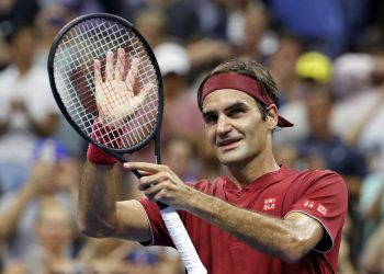 Roger Federer reacts after beating Yoshihito Nishioka in New York, Tuesday