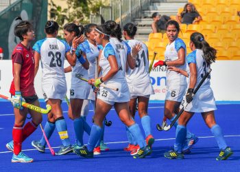 Indian players celebrate after scoring a goal against Thailand during the women's hockey pool match at the Asian Games, Monday