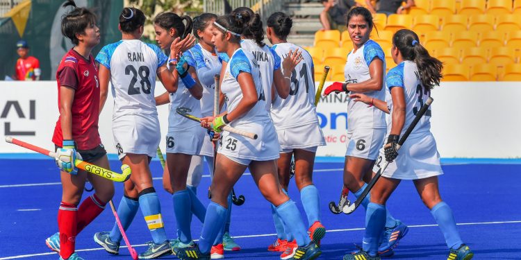 Indian players celebrate after scoring a goal against Thailand during the women's hockey pool match at the Asian Games, Monday