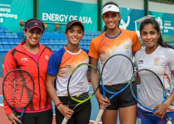 Indian women's tennis team members Ankita Raina, Karman Kaur and Prarthna with their coach Ankita Bhambri (L) pose for a photo after a practice session, Friday