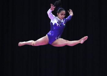 Dipa Karmakar performs on the balance beam during the women's apparatus gymnastics final competition at the Asian Games in Jakarta