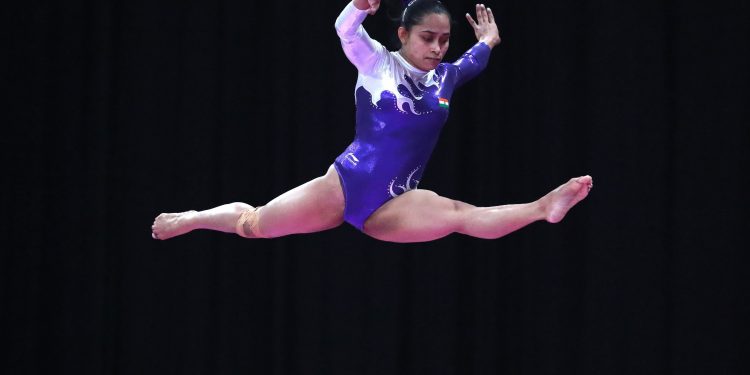 Dipa Karmakar performs on the balance beam during the women's apparatus gymnastics final competition at the Asian Games in Jakarta