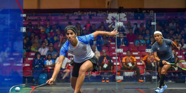 Joshna Chinappa in action against Nicole David in the squash team event semifinals, Friday