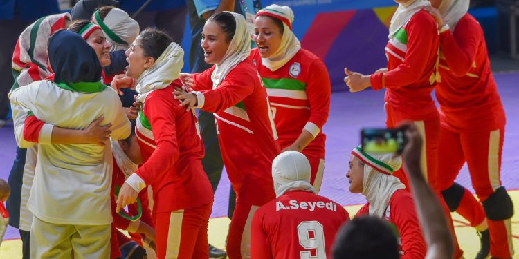 The victorious Iranian women's kabaddi team celebrate their win over India