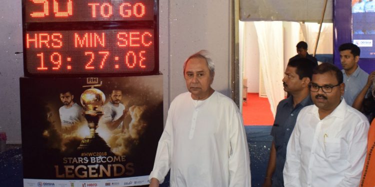 CM Naveen Patnaik unveils the countdown clock for the Men’s Hockey World Cup as sports and youth services minister Chandra Sarathi Behera looks on in Bhubaneswar, Wednesday