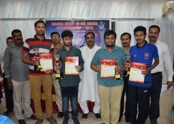 Winners of Odisha State U-25 Chess Championship pose with their trophies and certificates along with guests in Bhubaneswar, Sunday  
