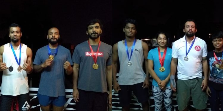 Odisha grapplers pose with their medals at Rohtak, Wednesday