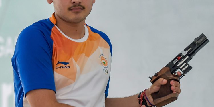 Anish Bhanwala looks disappointed after he failed to qualify for the finals of men's 25m Rapid Fire Pistol event at the Asian Games