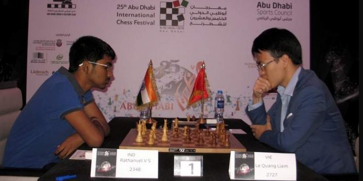 VS Rathanvel (L) plays against his Vietnam opponent