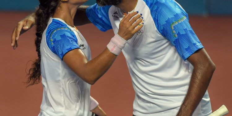 Rohan Bopanna and Ankita Raina celebrate after beating their Korean counterparts Na RJ Kim and Jeamoon Lee in the mix-doubles match in the Asian Games