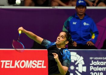 Saina Nehwal in action against  R Intanon during women's singles quarter final badminton match at the Asian Games