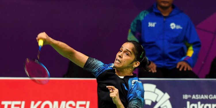 Saina Nehwal in action against  R Intanon during women's singles quarter final badminton match at the Asian Games